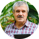 A portrait of participant persona Robert, a retired delivery driver using financial wellness tools to manage health care costs and help fund his grandchildren’s education.