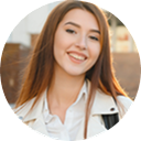 A portrait of the participant persona Jasmine, a medical assistant focused on building retirement savings and reducing debt through financial wellness resources.